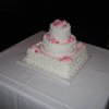 3 Tier15-2 - 3 tiers round and square with pink airbrushed buttercream roses.6", 9" 12" 14+ pounds, serves 75-90